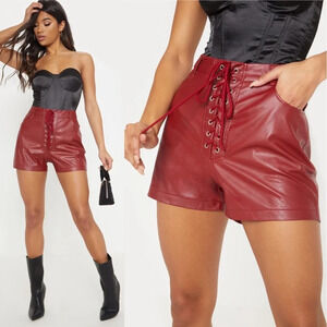 PrettyLittleThing marroon faux leather lace up shorts size 4 NWT